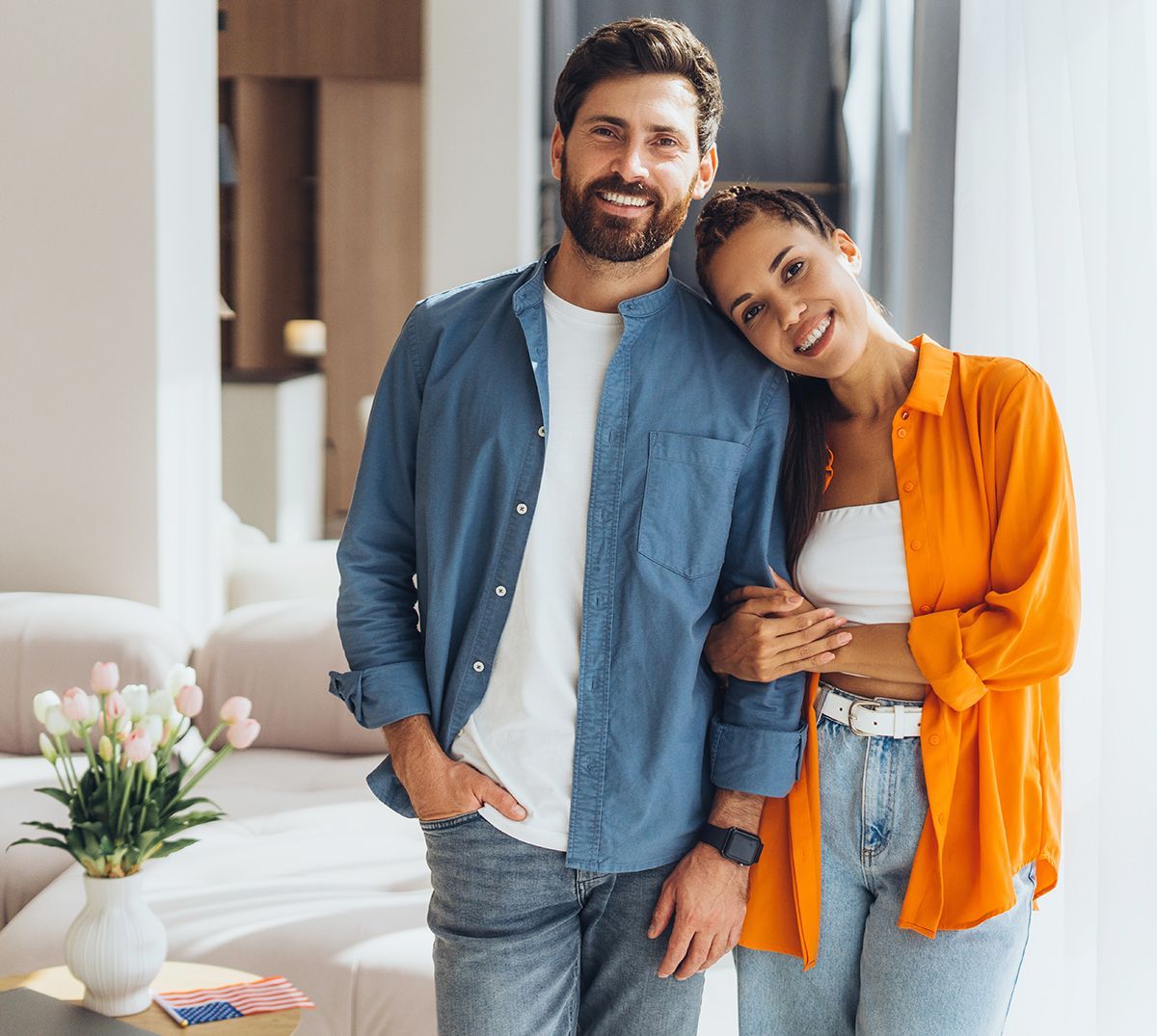 Happy homeowners after painting project