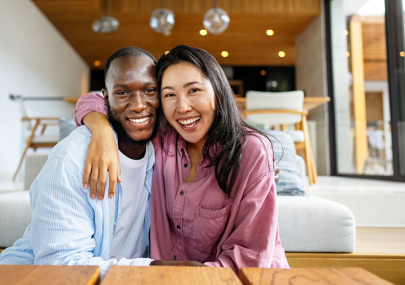 Happy homeowners enjoying their freshly painted home