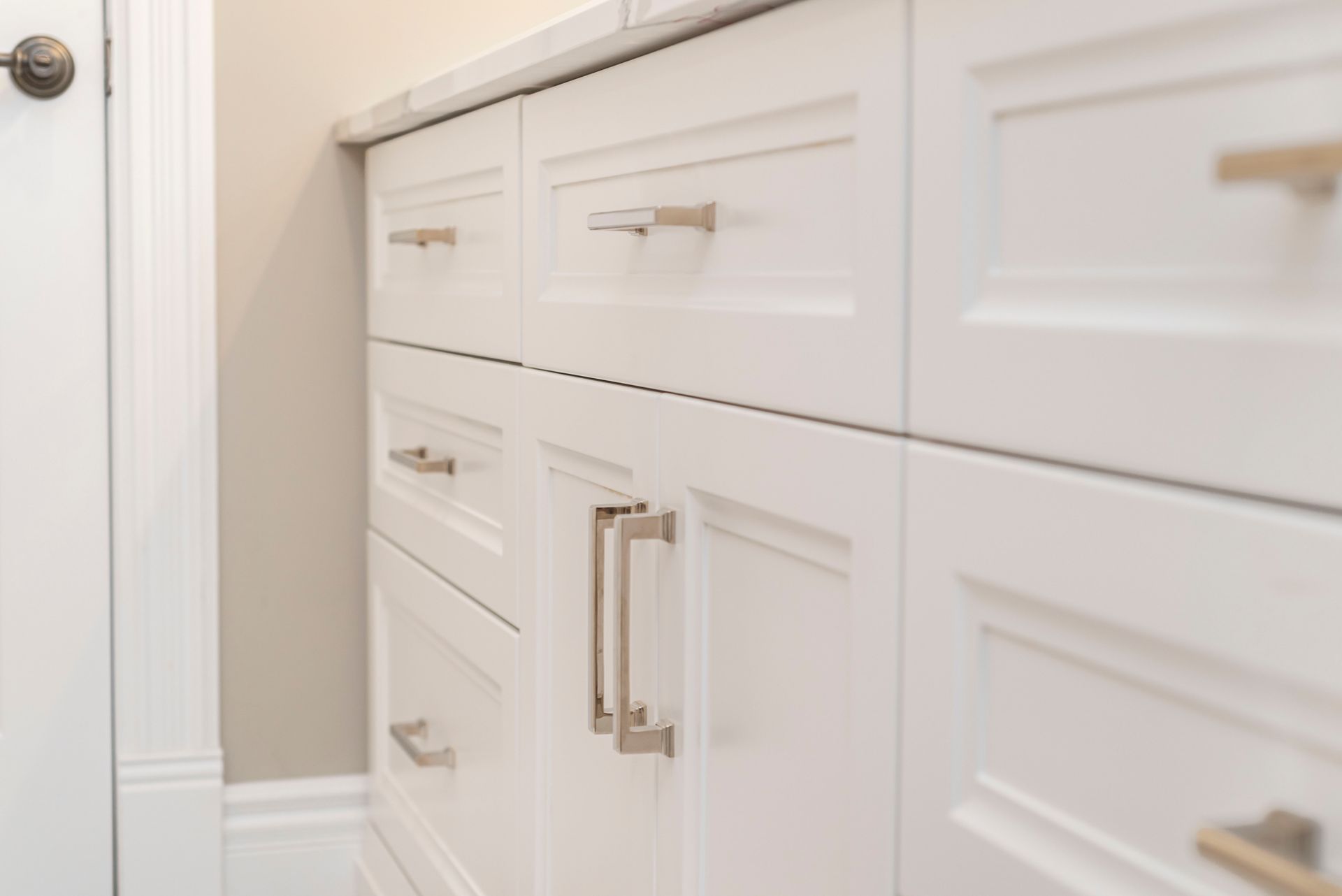 White cabinets and drawers.