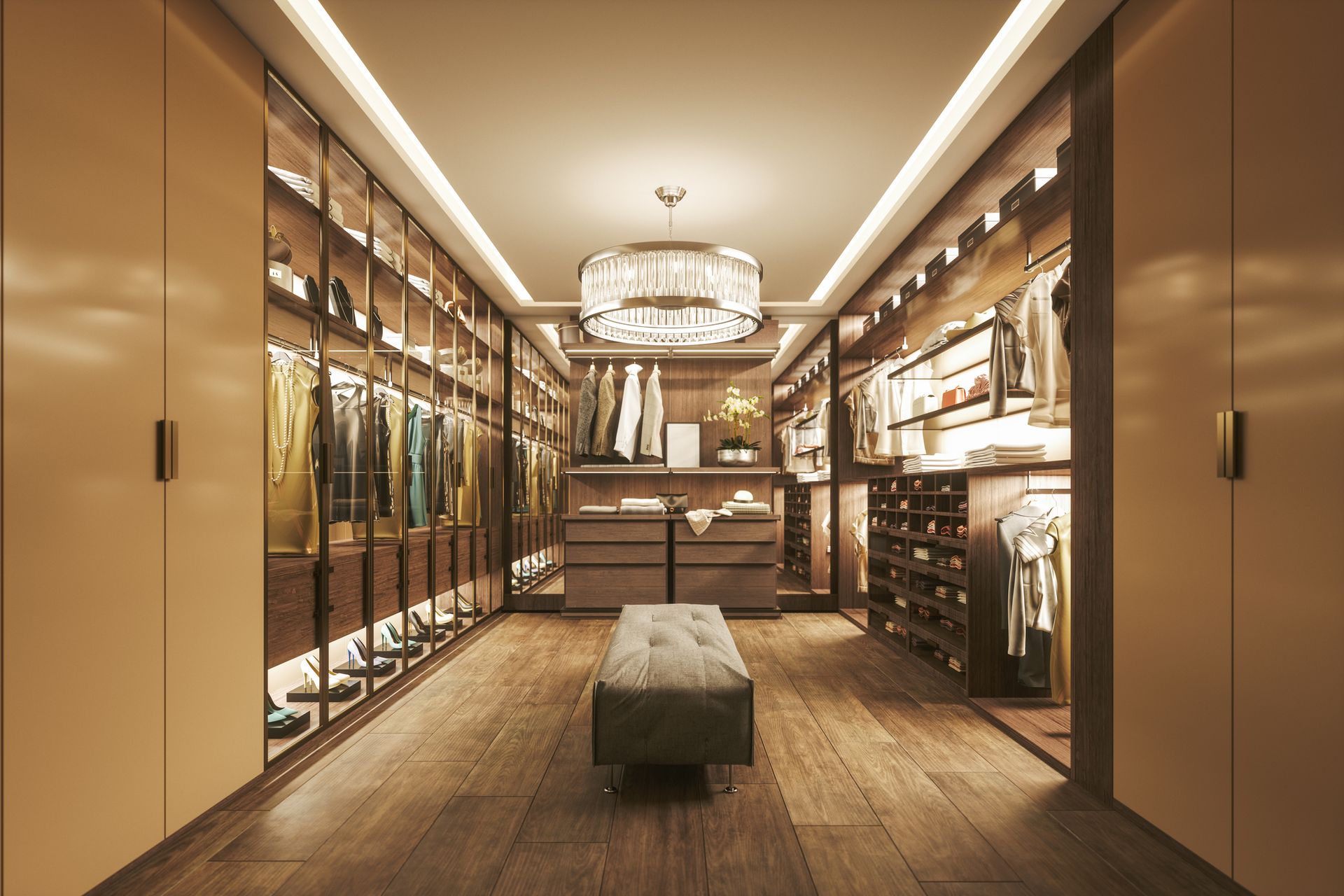 A large walk in closet with lots of clothes and a bench.