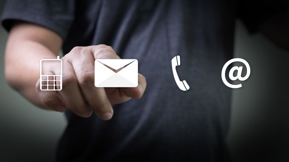 Back View of Modern Man Working at Farm in Sunlit Cow Shed — Milking & Farming Equipment on the Mid North Coast, NSW