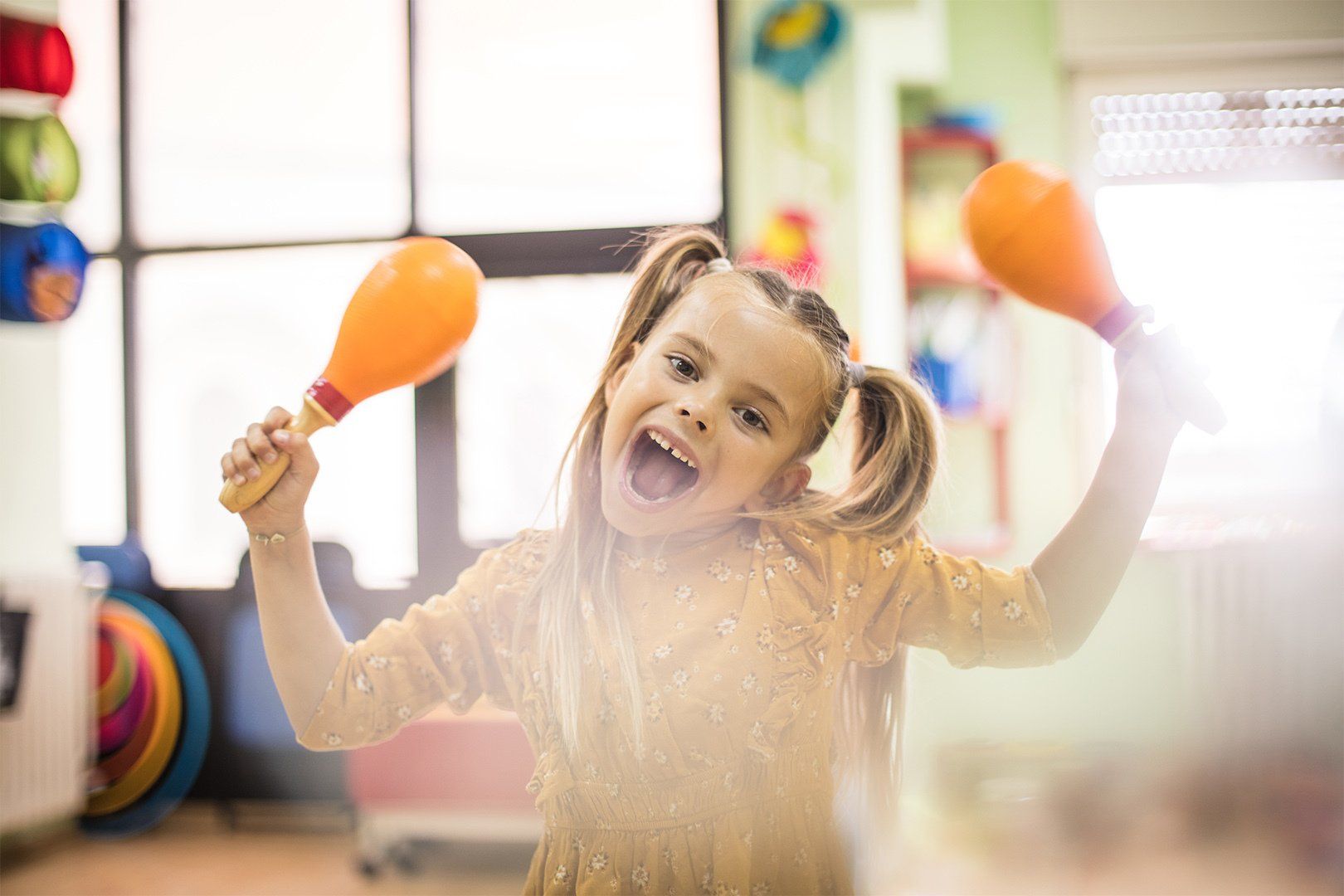 Making fun with music. Child in music school.