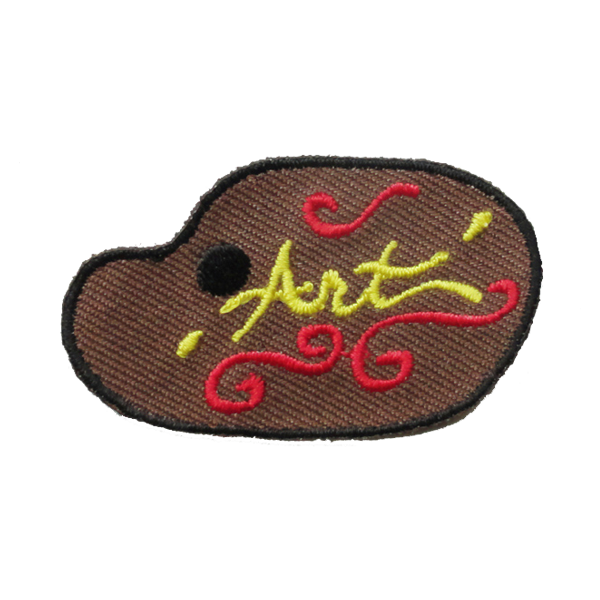 A patch that has the word art on it badge.