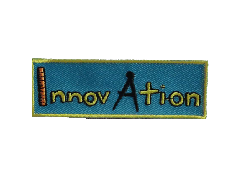 A blue and yellow patch that says innovation on it badge.