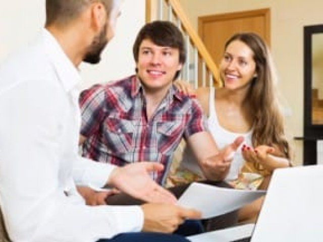 Family looking at computer
