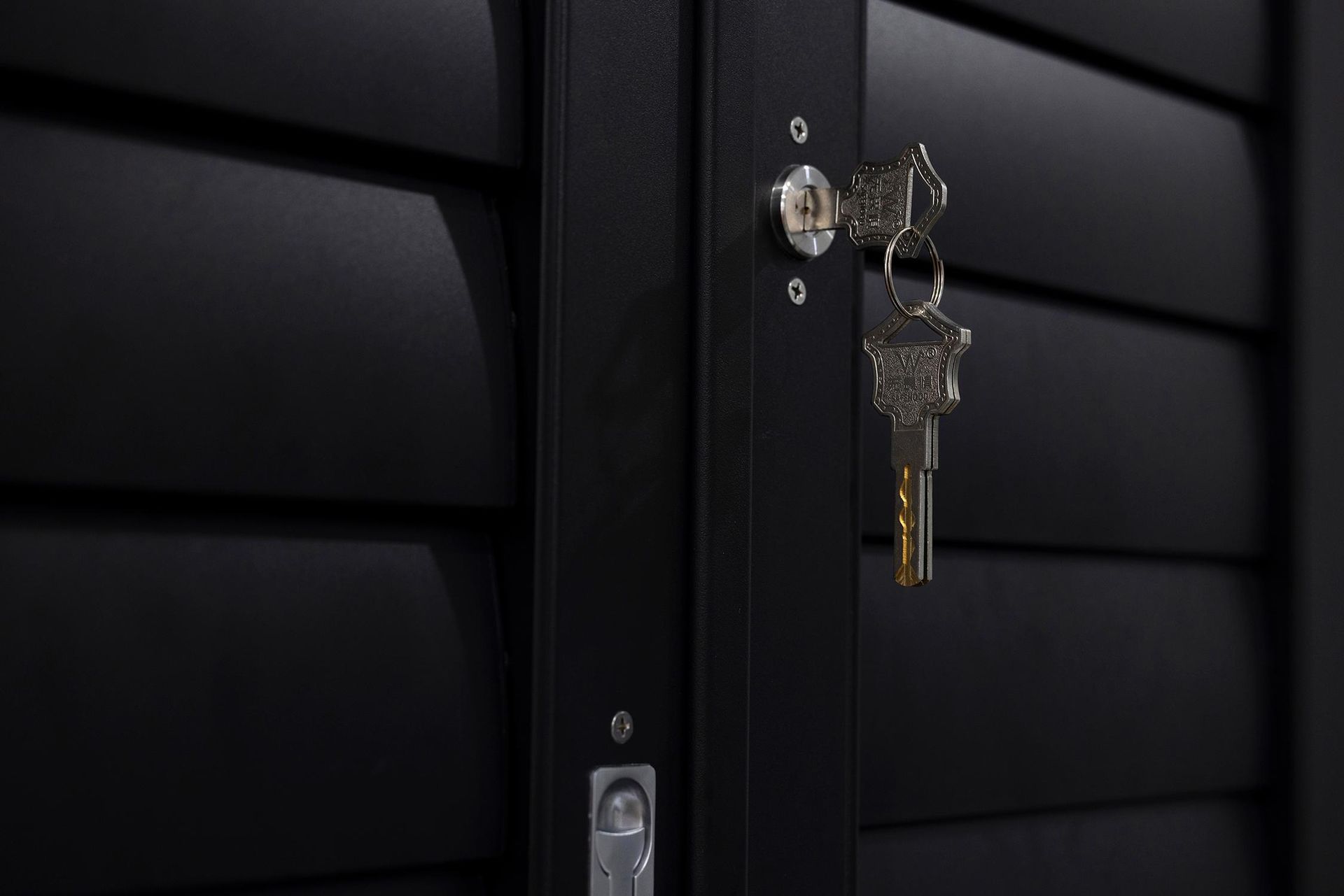 A Close Up Of A Key In Cabinet Storage  — Wares Blinds, Screens & Awnings In Gladstone Central, QLD