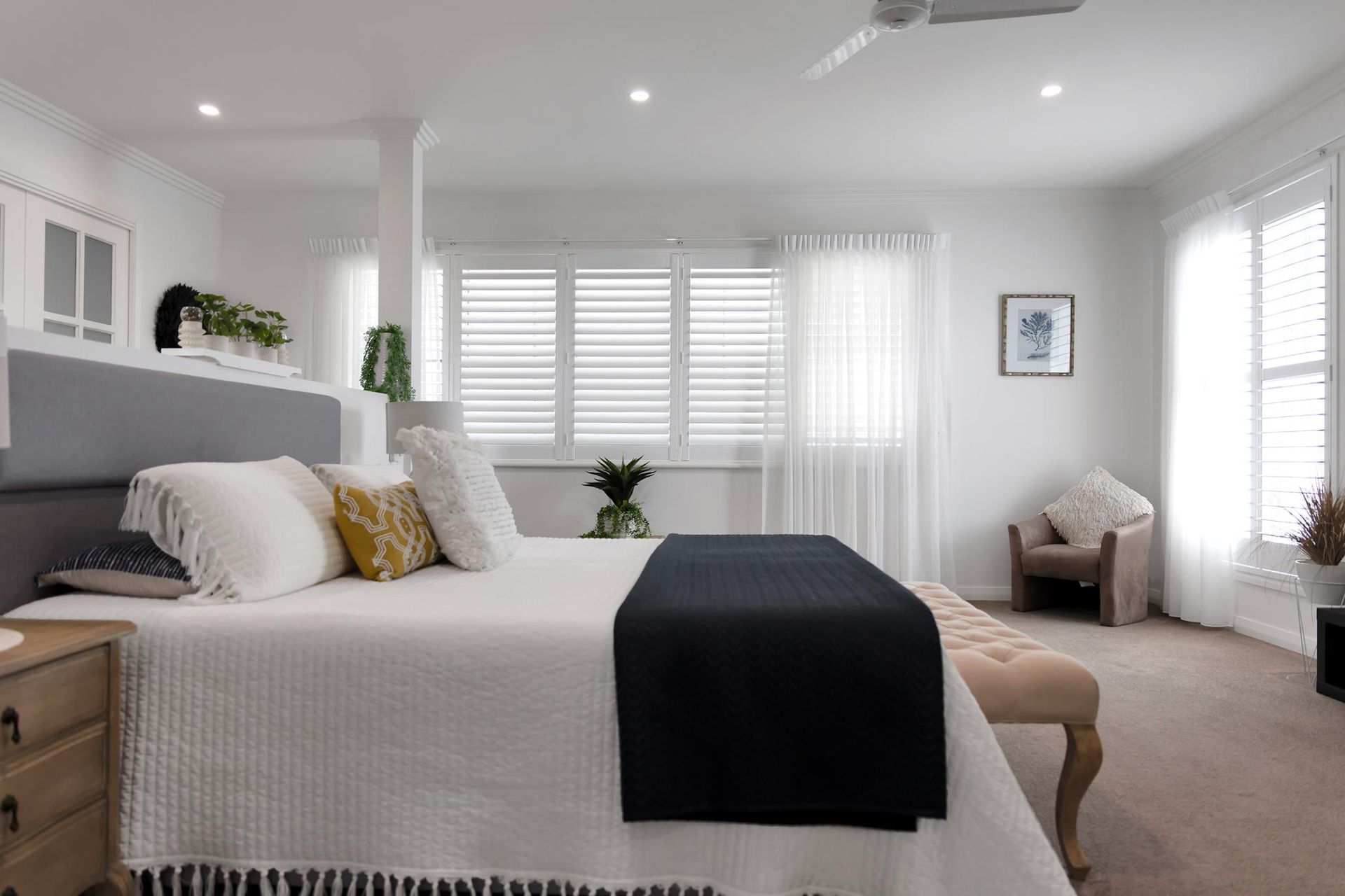 There Is A Large Bed In The Middle Of The Room  — Wares Blinds, Screens & Awnings In Gladstone Central, QLD