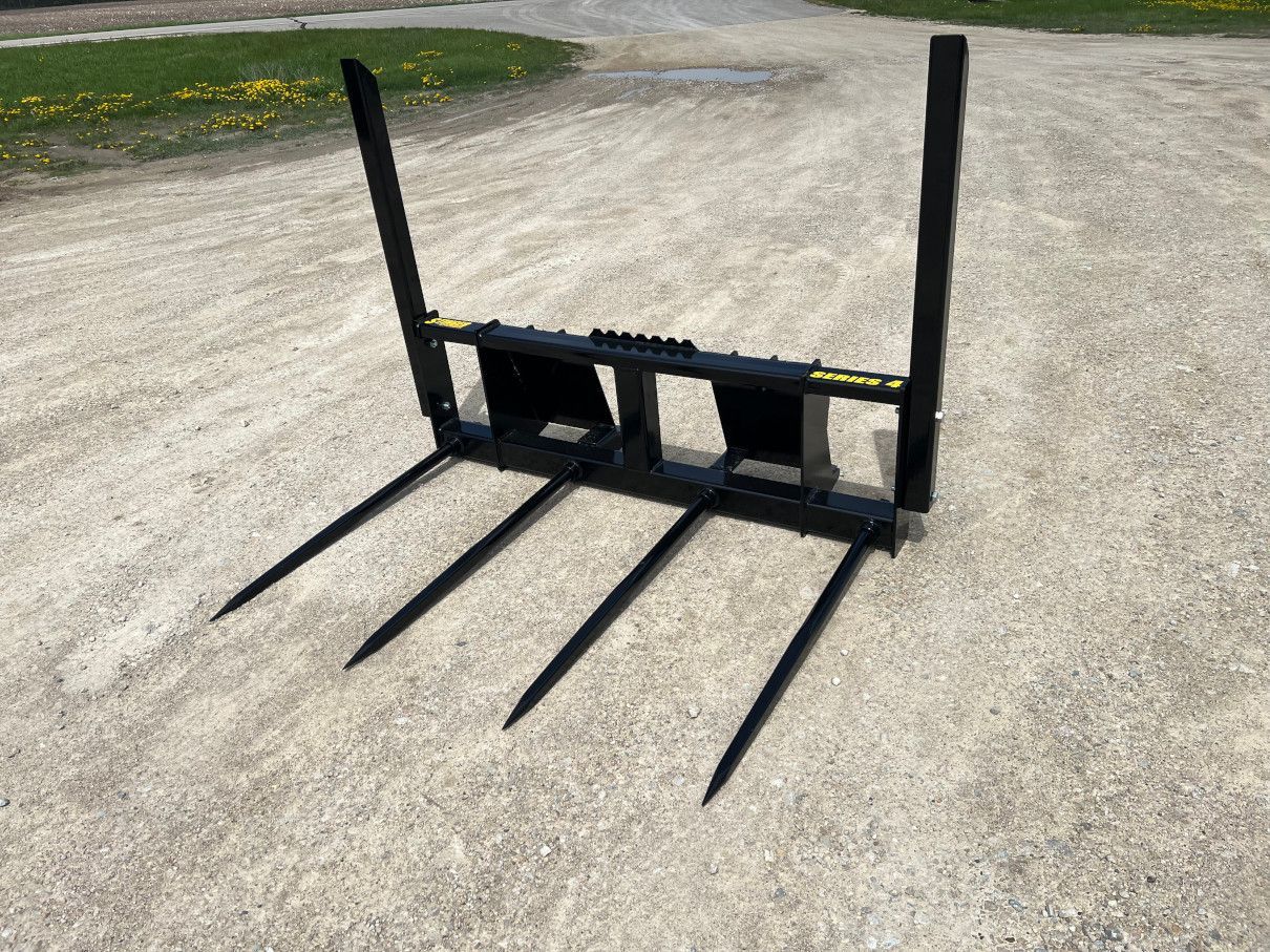Stinger BS4 skid steer bale spear attachment for handling round hay bales