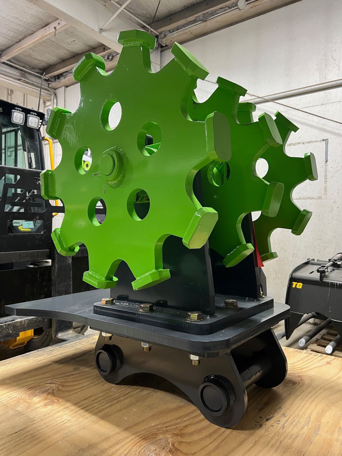 Excavator compaction wheel attachment for compacting trench backfill and soil on excavation projects