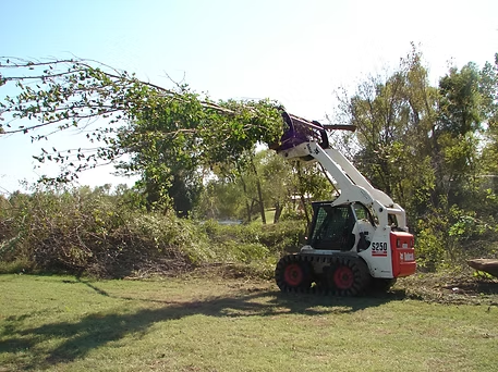 M&M Attachments | Hydra Rake Skid Steer Brush Grapple