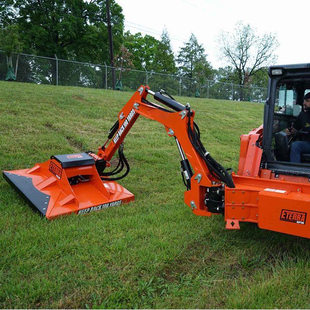 Eterra Raptor skid steer boom arm with sidewinder showing extended reach for roadside mowing and vegetation control