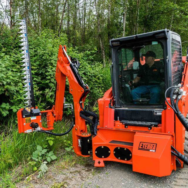 Eterra Raptor mounted sickle bar mower skid steer attachment designed for cutting tall grass, weeds and roadside vegetation