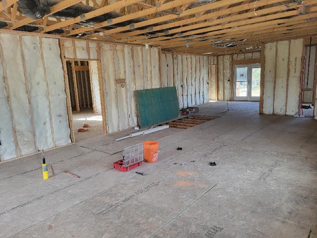 A large room with a lot of insulation on the walls and ceiling.