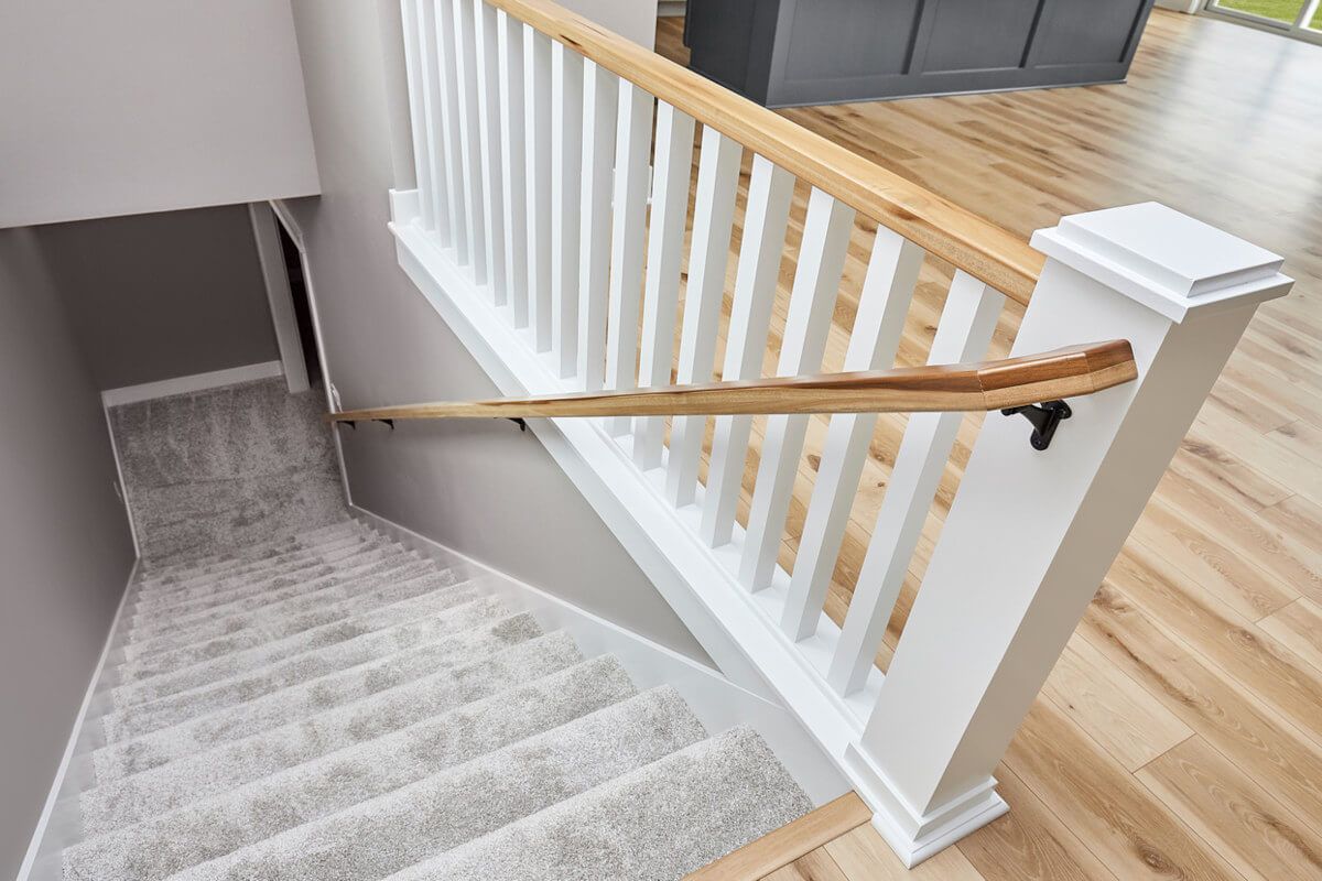 Professional staircase carpet installation in a Longbenton home by Foxglove Flooring carpet fitters.
