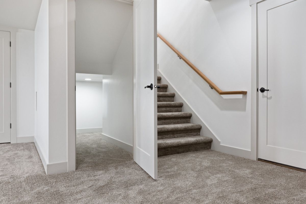 Fitted staircase carpet in a Ponteland executive home by Foxglove Flooring carpet fitters.