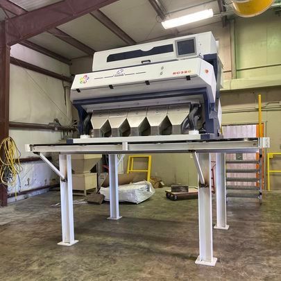A machine is sitting on top of a table in a building.