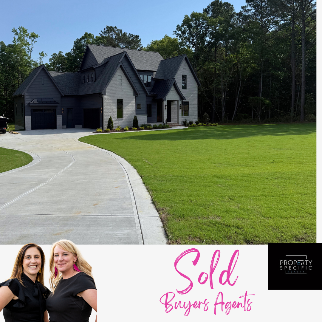 A modern two-story house with a long driveway, advertised as