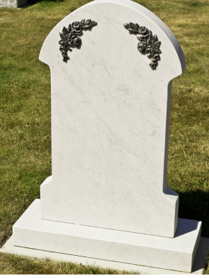 A gravestone for king morton brandon and joan smith in a cemetery.