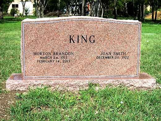 A gravestone for king morton brandon and joan smith in a cemetery.