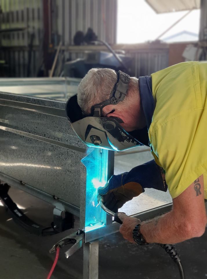 Welder Repairing Truck — The Trailer Factory In Port Macquarie, NSW