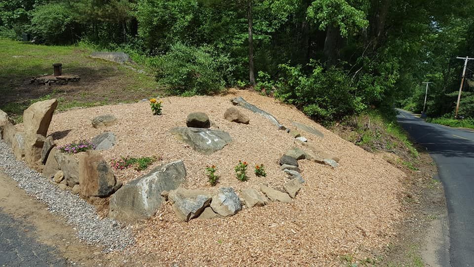 A road with a lot of rocks and gravel on the side of it.