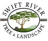 The logo for swift river tree and landscape shows a tree in a field.