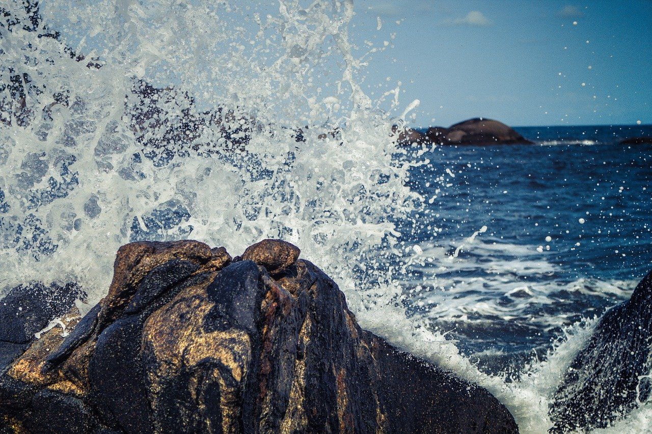 Waves splashing against a rock