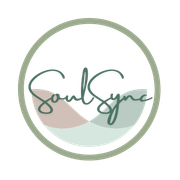 Logo for SoulSync, featuring script lettering over two colored wave shapes, within a green circle.