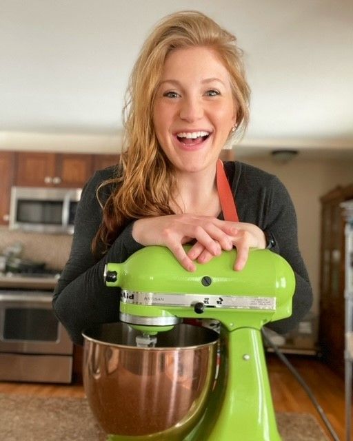 Mackenzie of Pink Apron Bakery with her mixer and bowl.