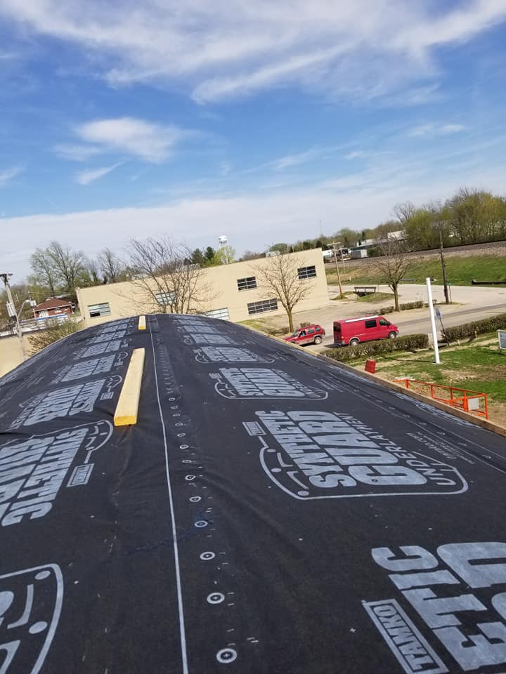 Black Cover On A Metal Roofing Installation — Salem, MO — Carr's Exterior & Gutter Solutions