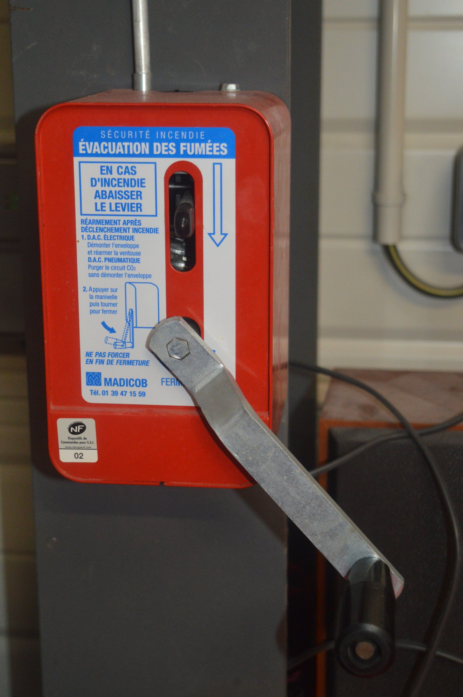 poigné désenfumage Odile Extincteurs