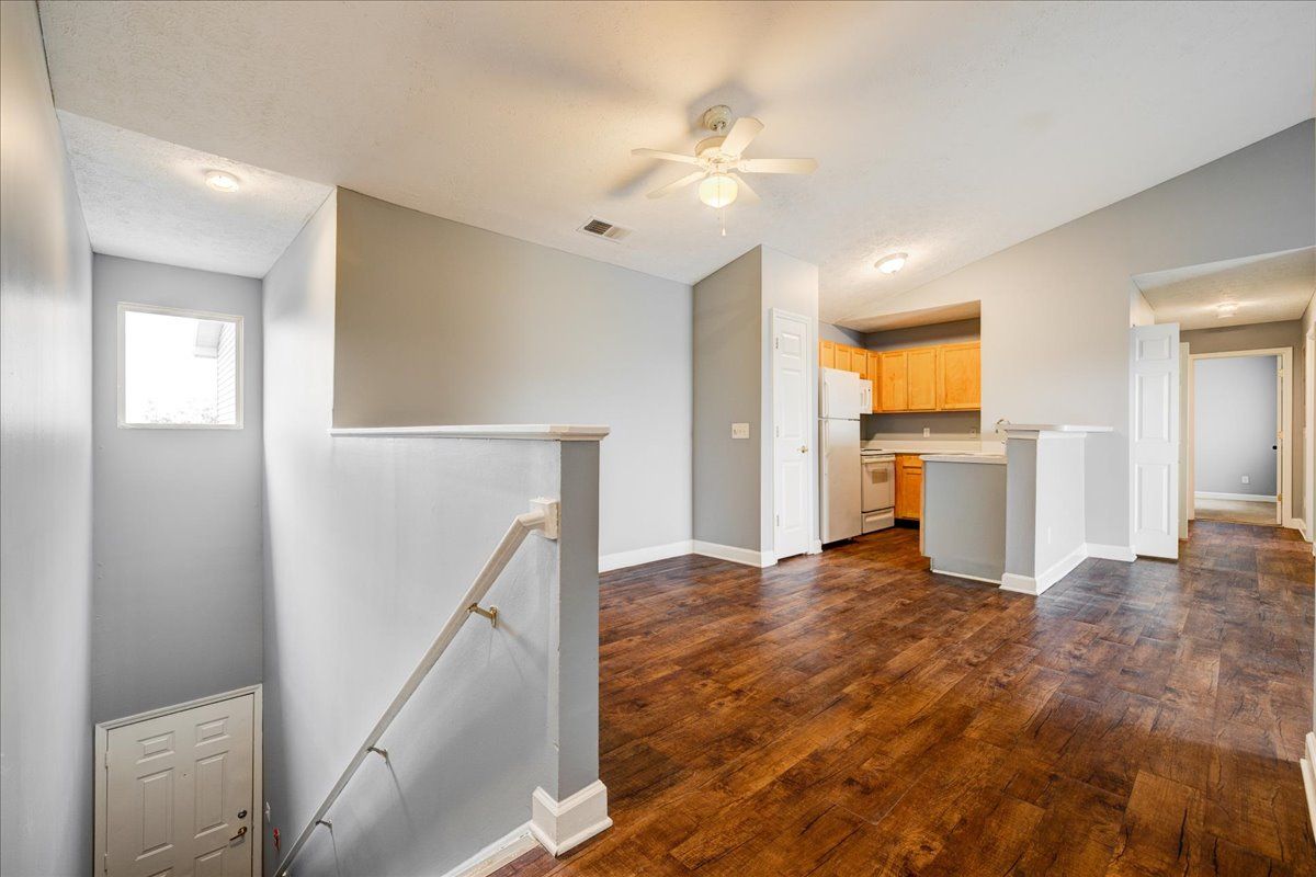 There is a staircase leading up to the second floor of a house.