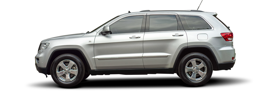 Silver Jeep Grand Cherokee SUV, side view. | B&J Auto Repair & Transmission