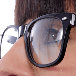 Eyeglasses — Woman Wearing Glasses in Prescott, AZ