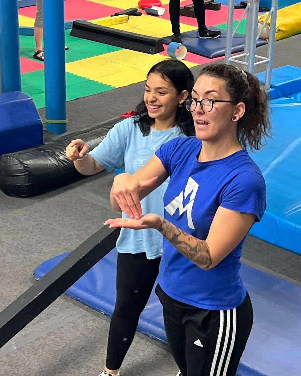 Coach Christine giving instruction