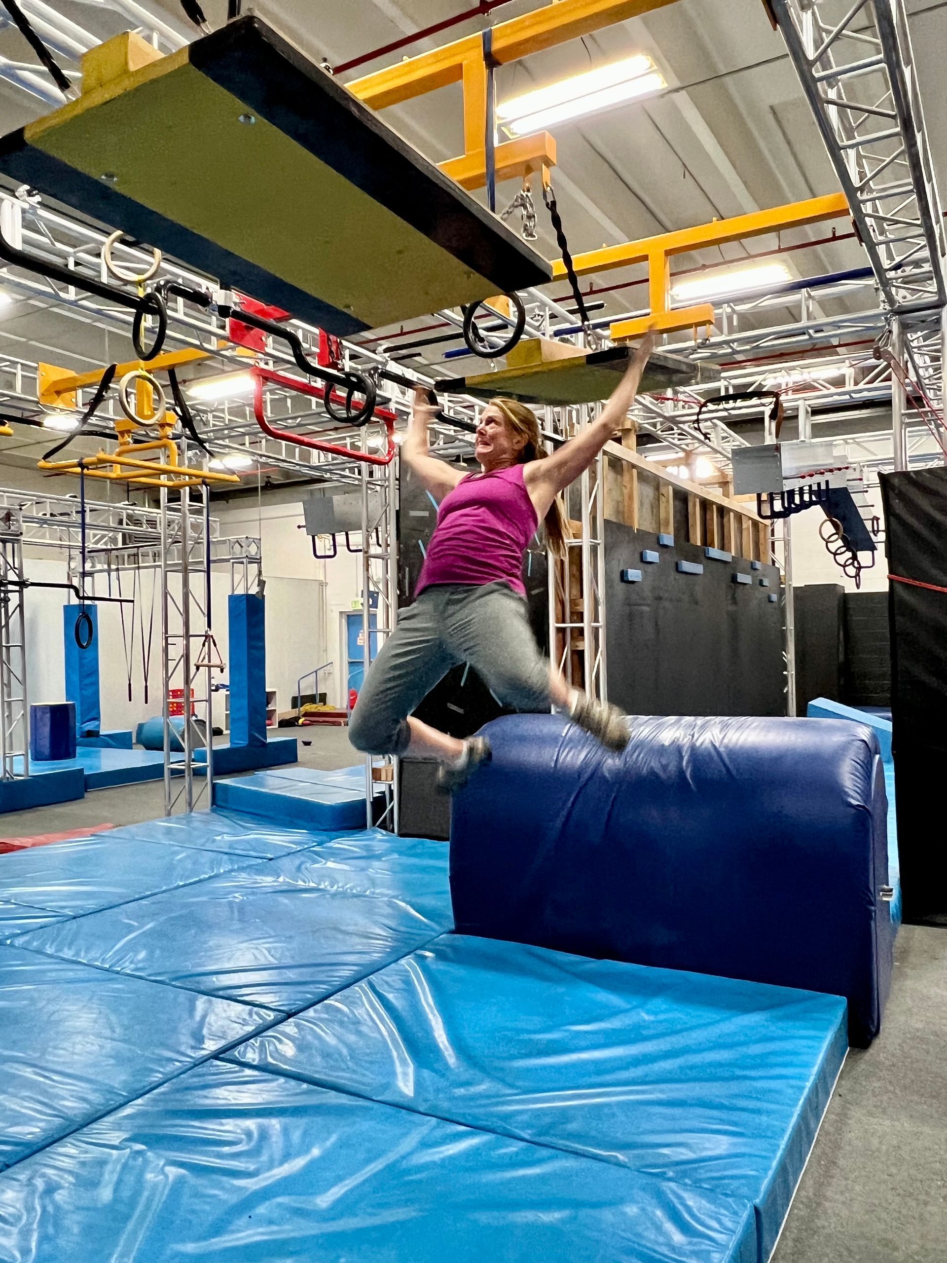 Woman doing ninja warrior