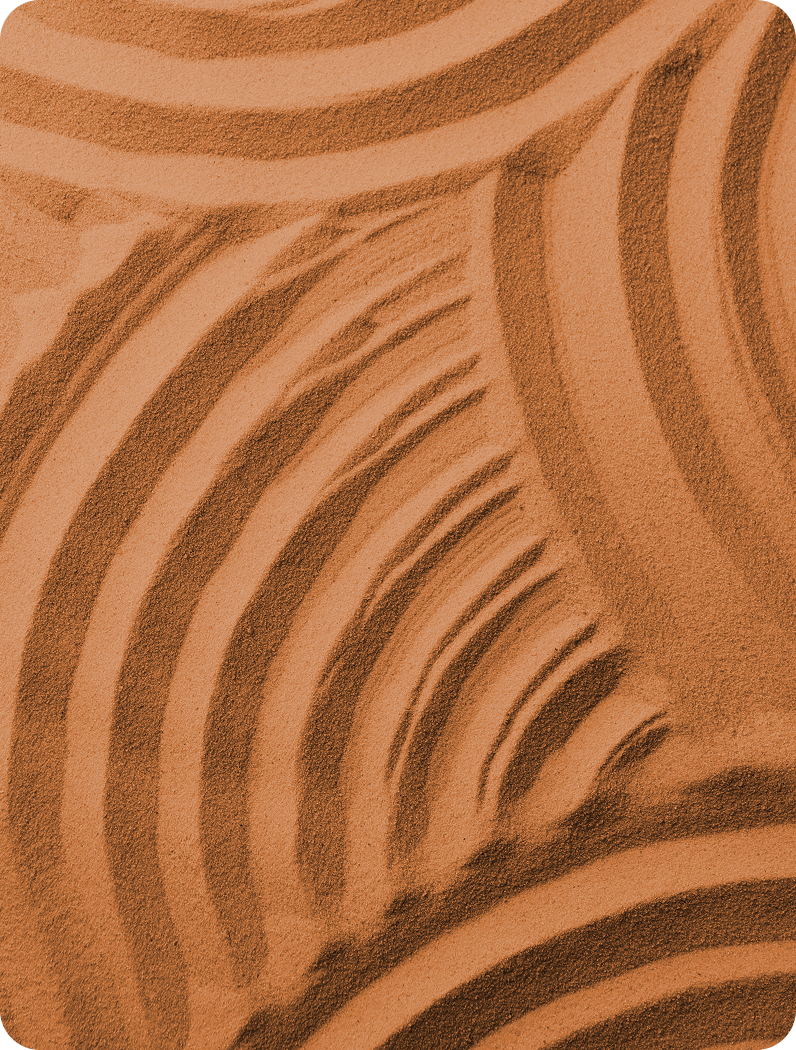 A close up of a zebra print on a brown surface.
