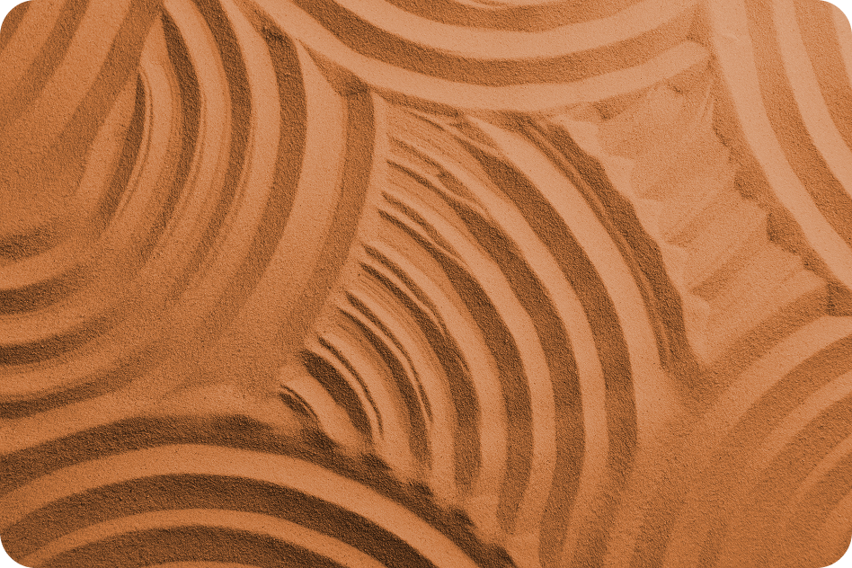 A close up of a brown surface with a swirl pattern