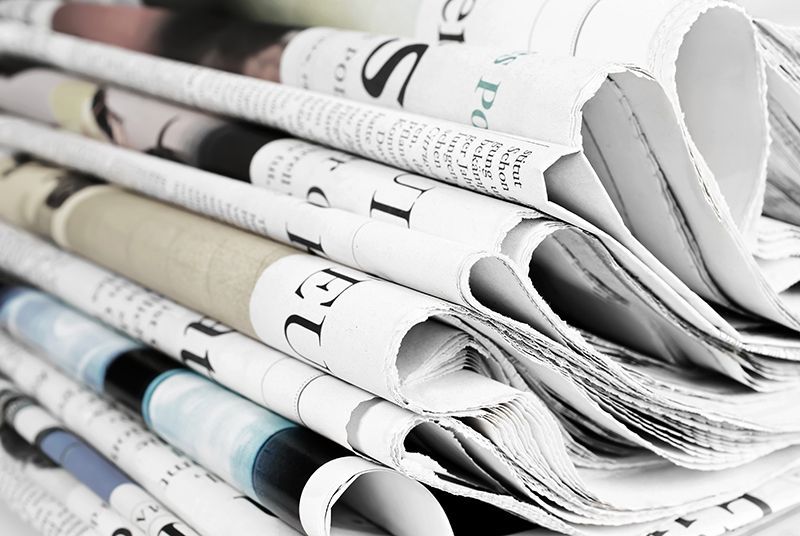 a stack of newspapers