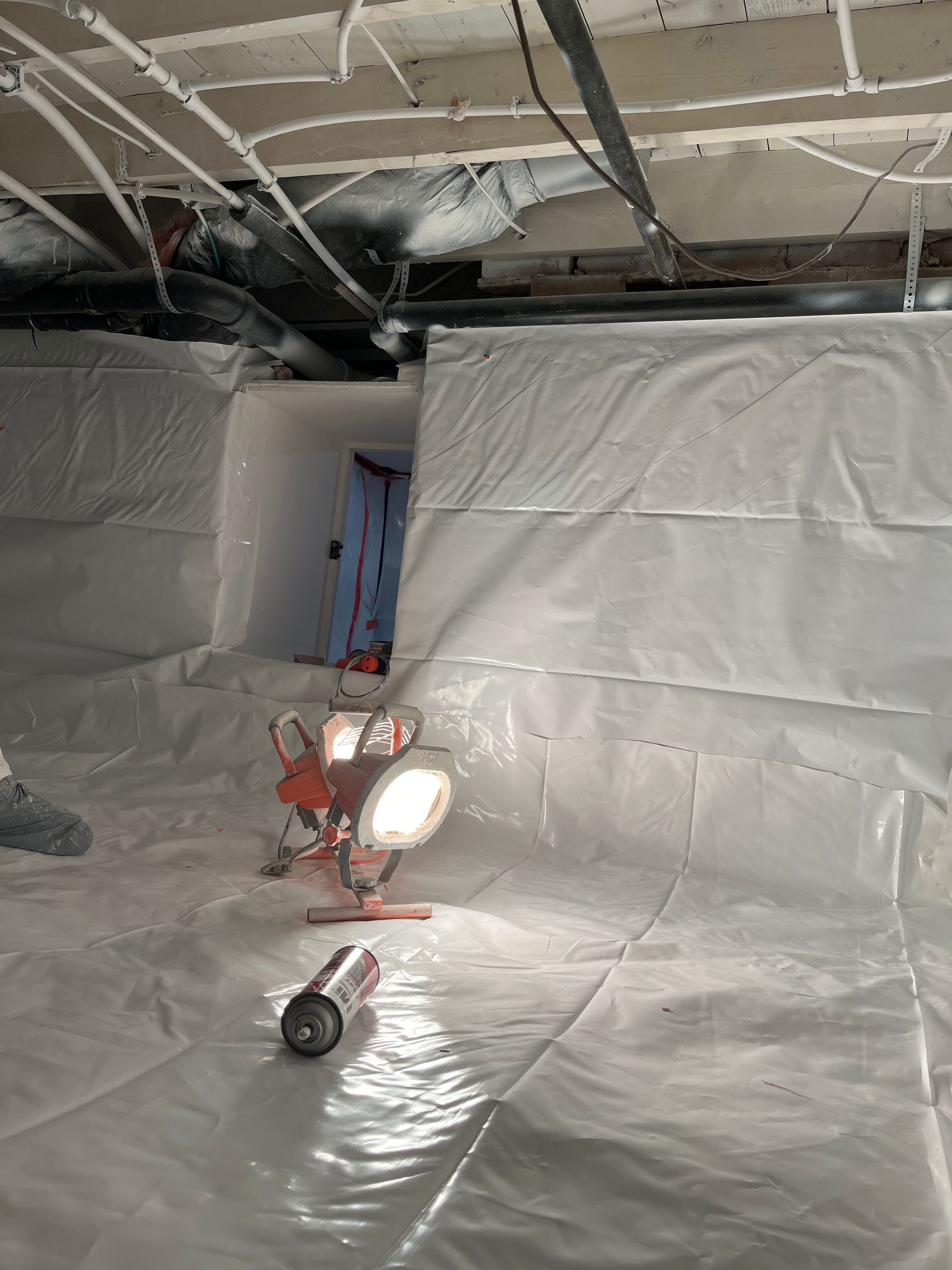 Vapor barrier install on crawl space. 