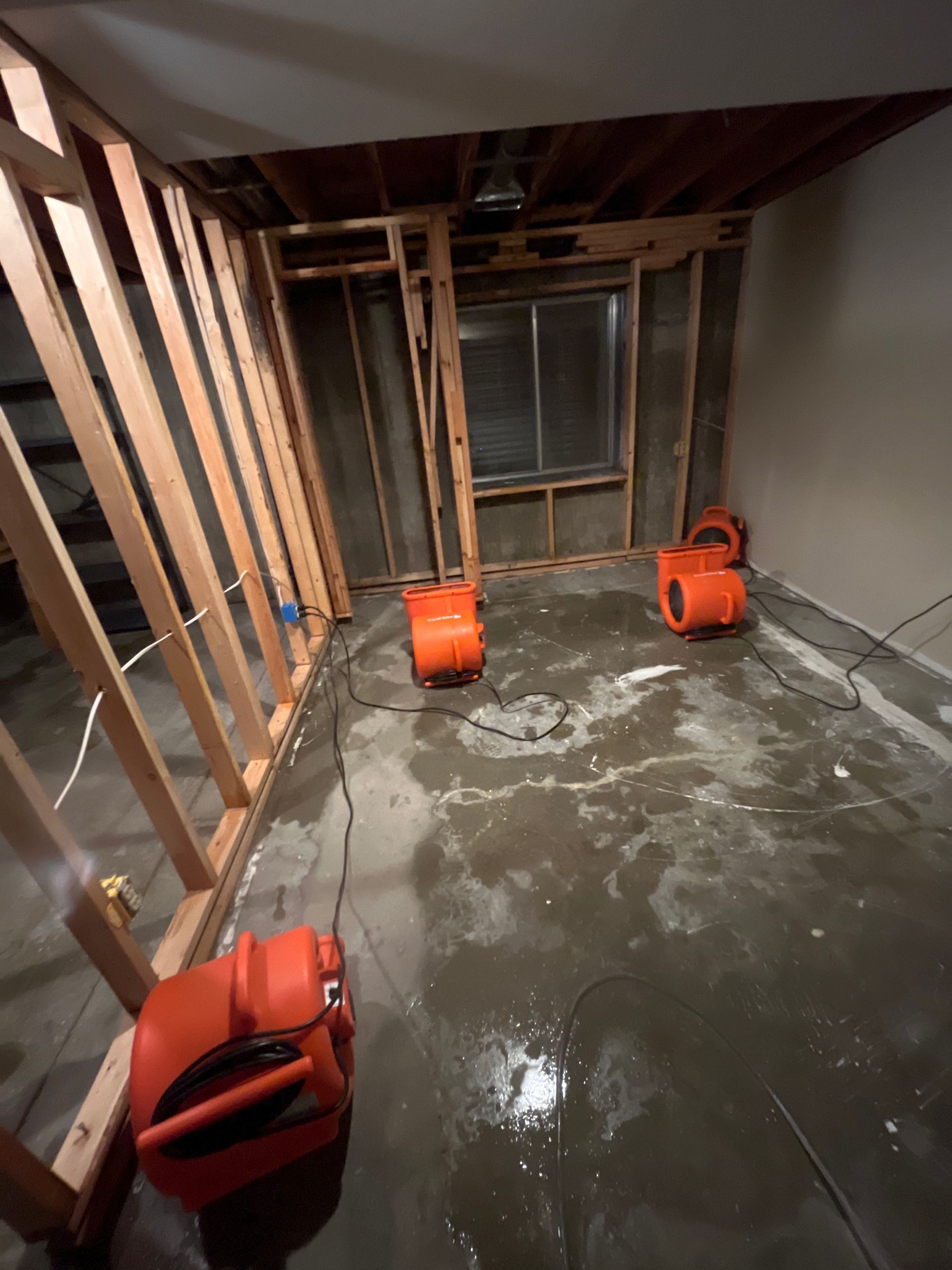 Water damage equipment in action. HEPA air  scrubbers, Dehumidifiers and Air Movers