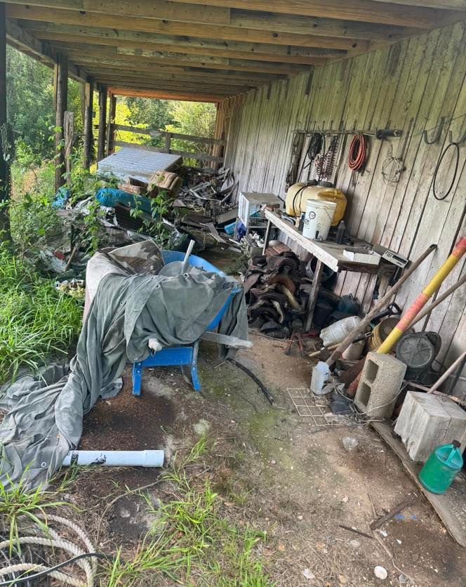 There is a wheelbarrow in the middle of the room.