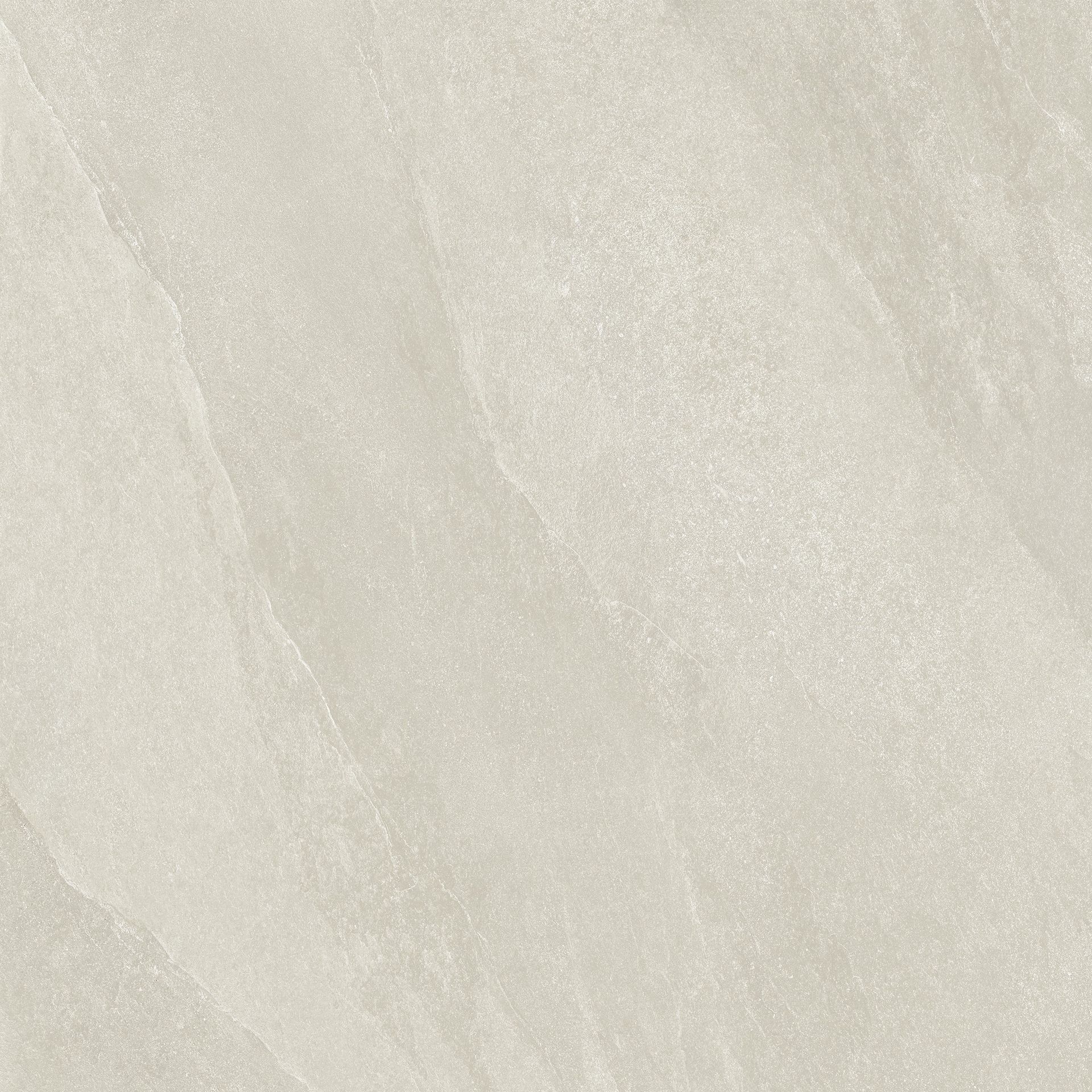 Nærmynd af hvítum flísum með marmaraáferð.