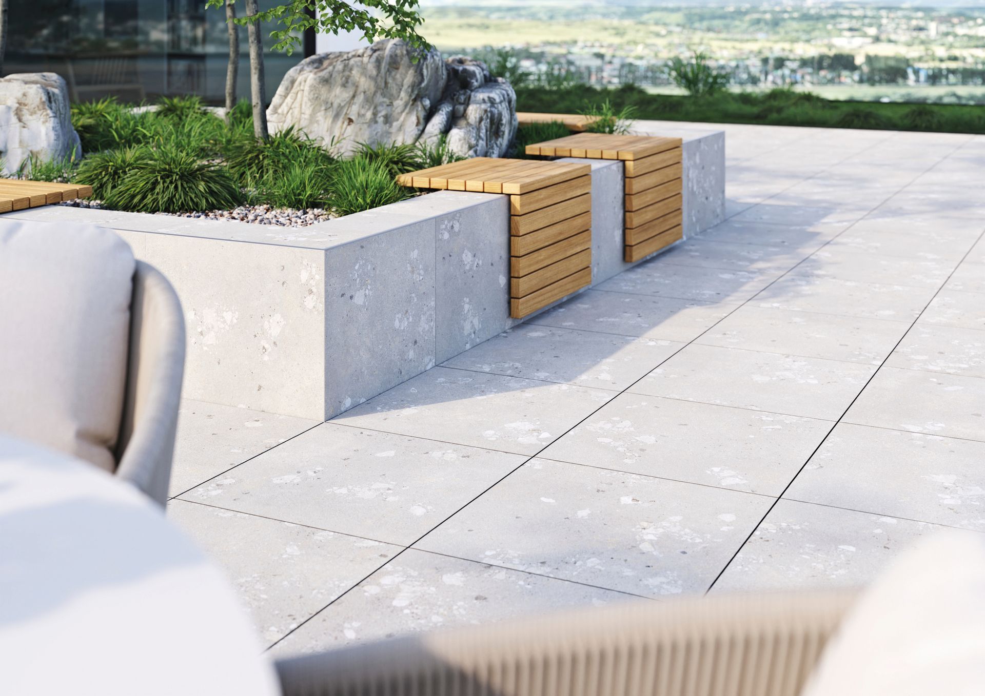 Verönd með borði, stólum, bekkjum og steinum.