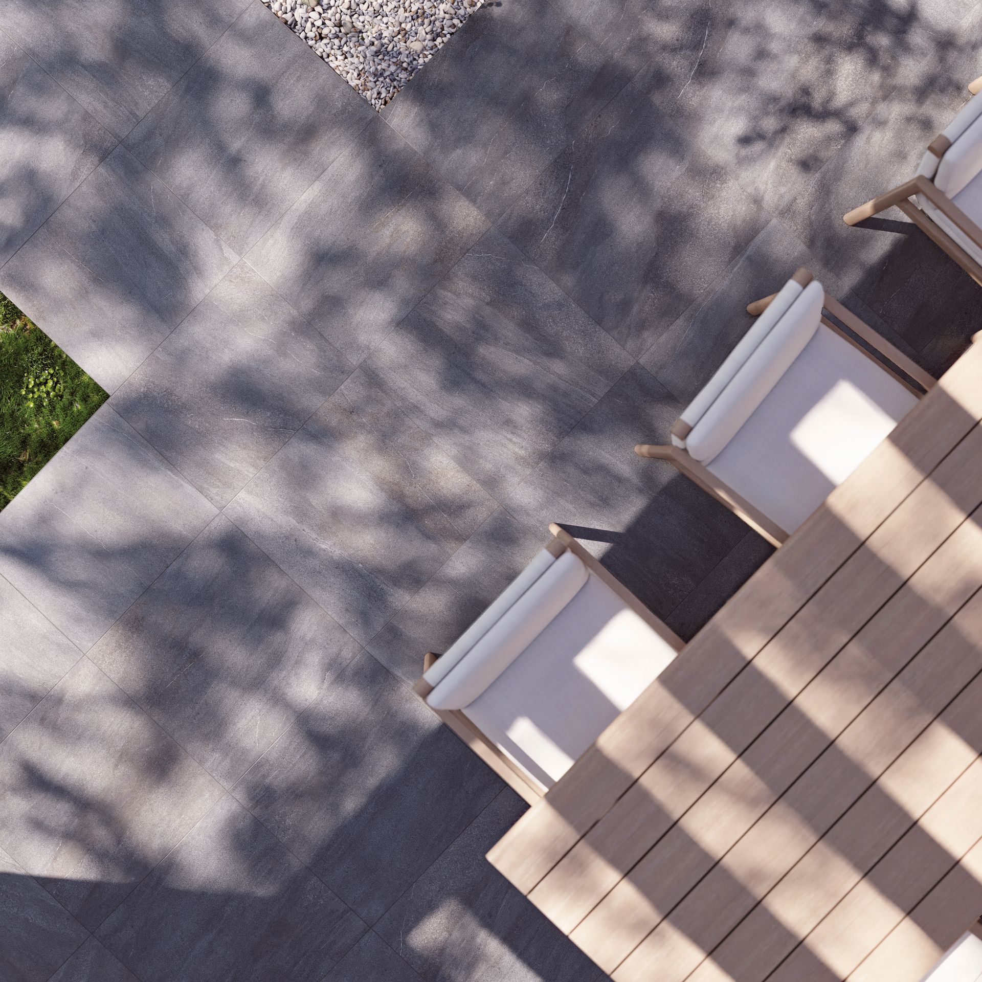 Loftmynd af verönd með borði og stólum