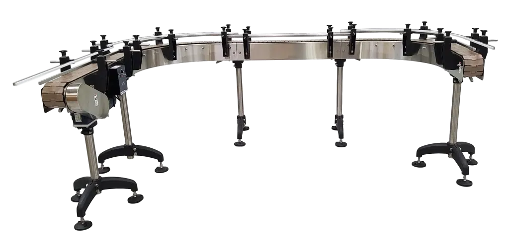 A curved industrial conveyor belt system made of stainless steel with adjustable support legs and black guide rails.