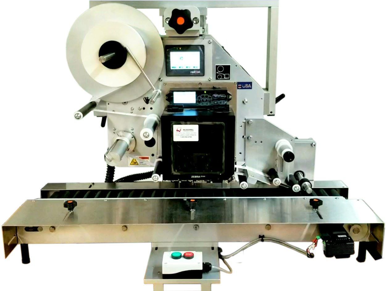 Industrial automatic label applicator machine with a conveyor belt.