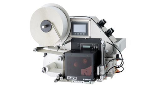 Industrial label printer with a white supply roll.