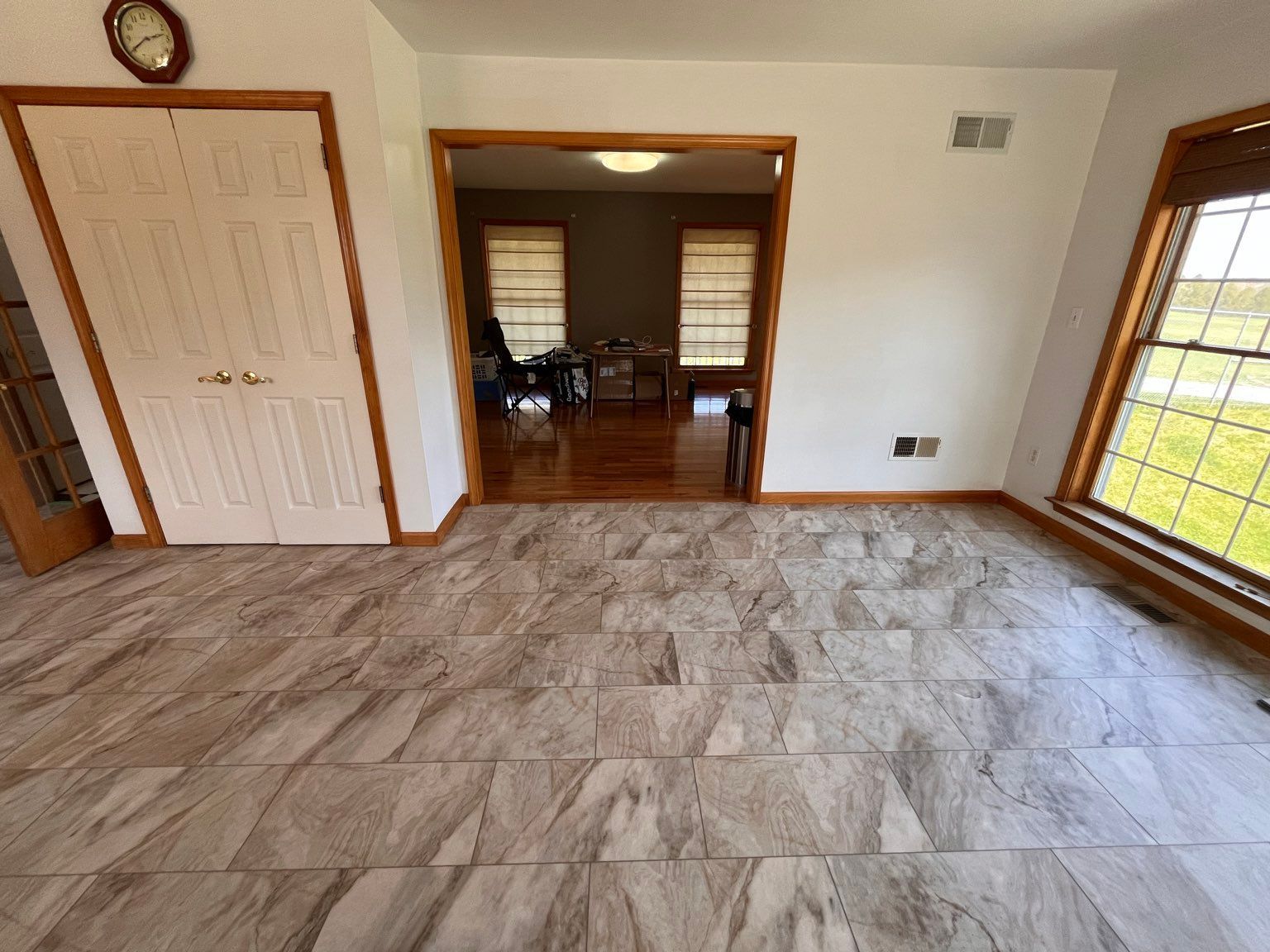 A room with a tiled floor by Floor Source