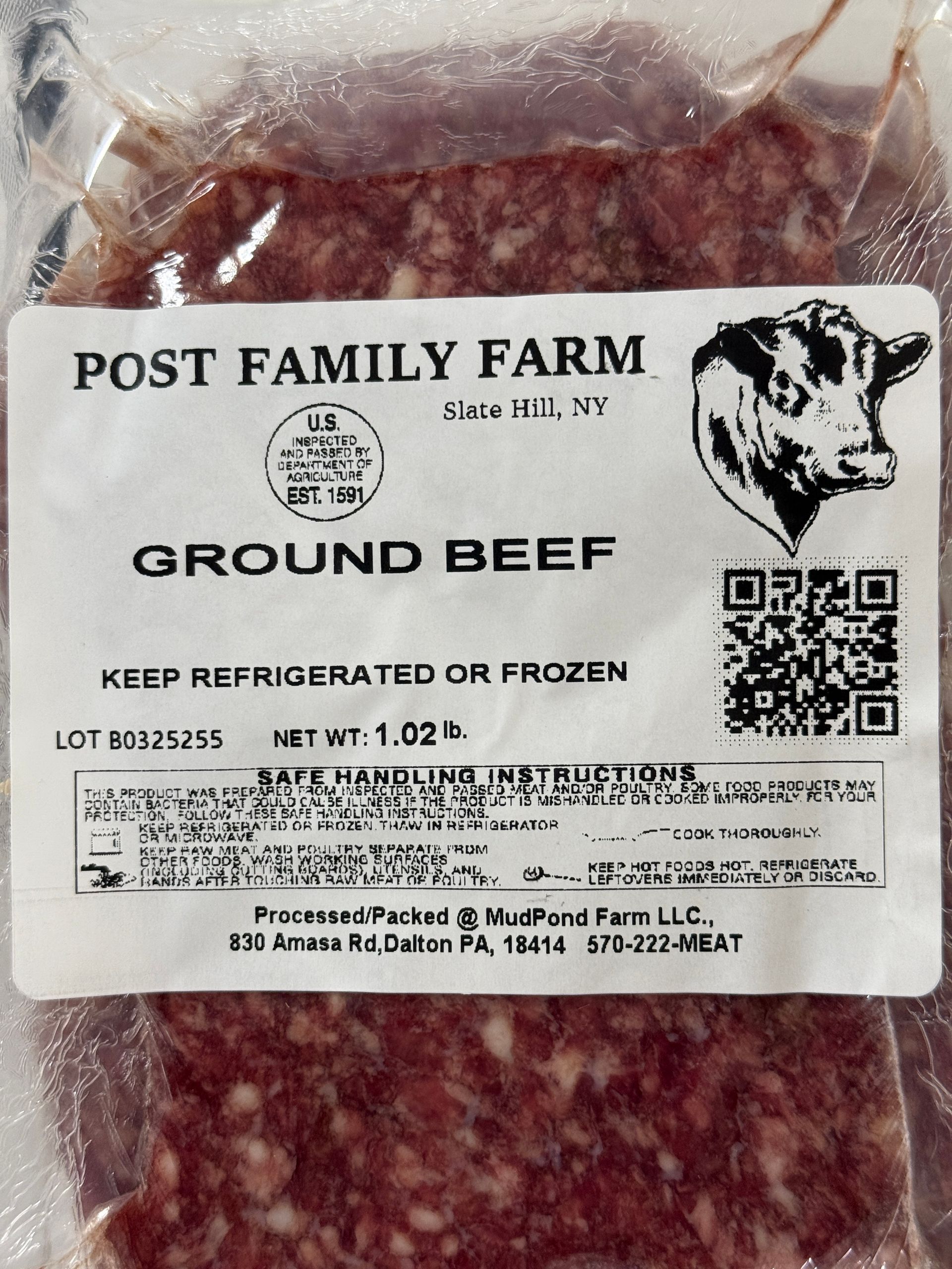 Packaged ground beef from Post Family Farm with a label.
